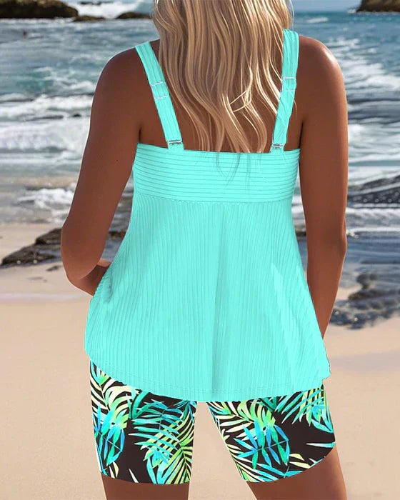 Cyan ribbed back tankini top with palm-leaf print swim shorts