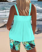 Cyan ribbed back tankini top with palm-leaf print swim shorts