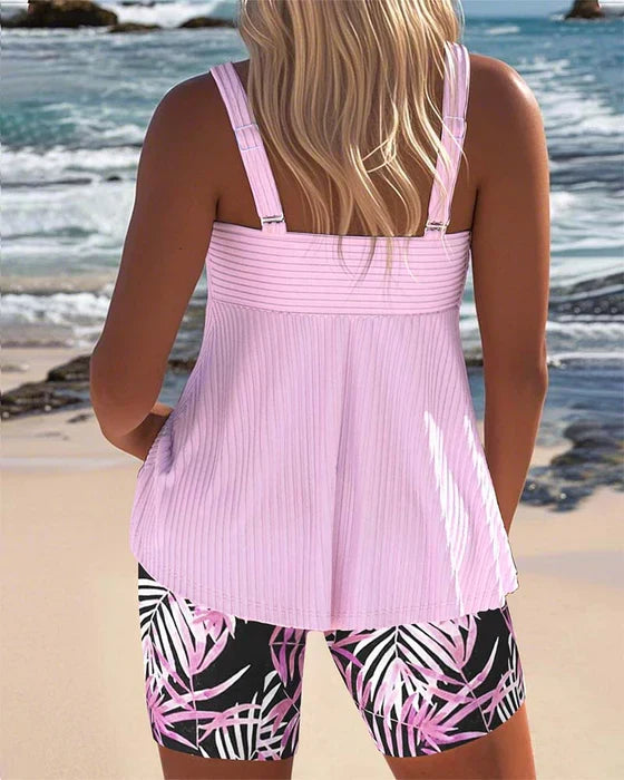 Pink ribbed back tankini top with palm-leaf print swim shorts