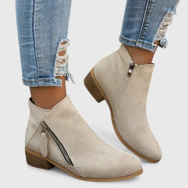 Beige suede orthopedic ankle boots with side zipper and low block heel