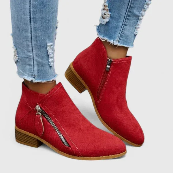 Red suede orthopedic ankle boots with side zipper and low block heel