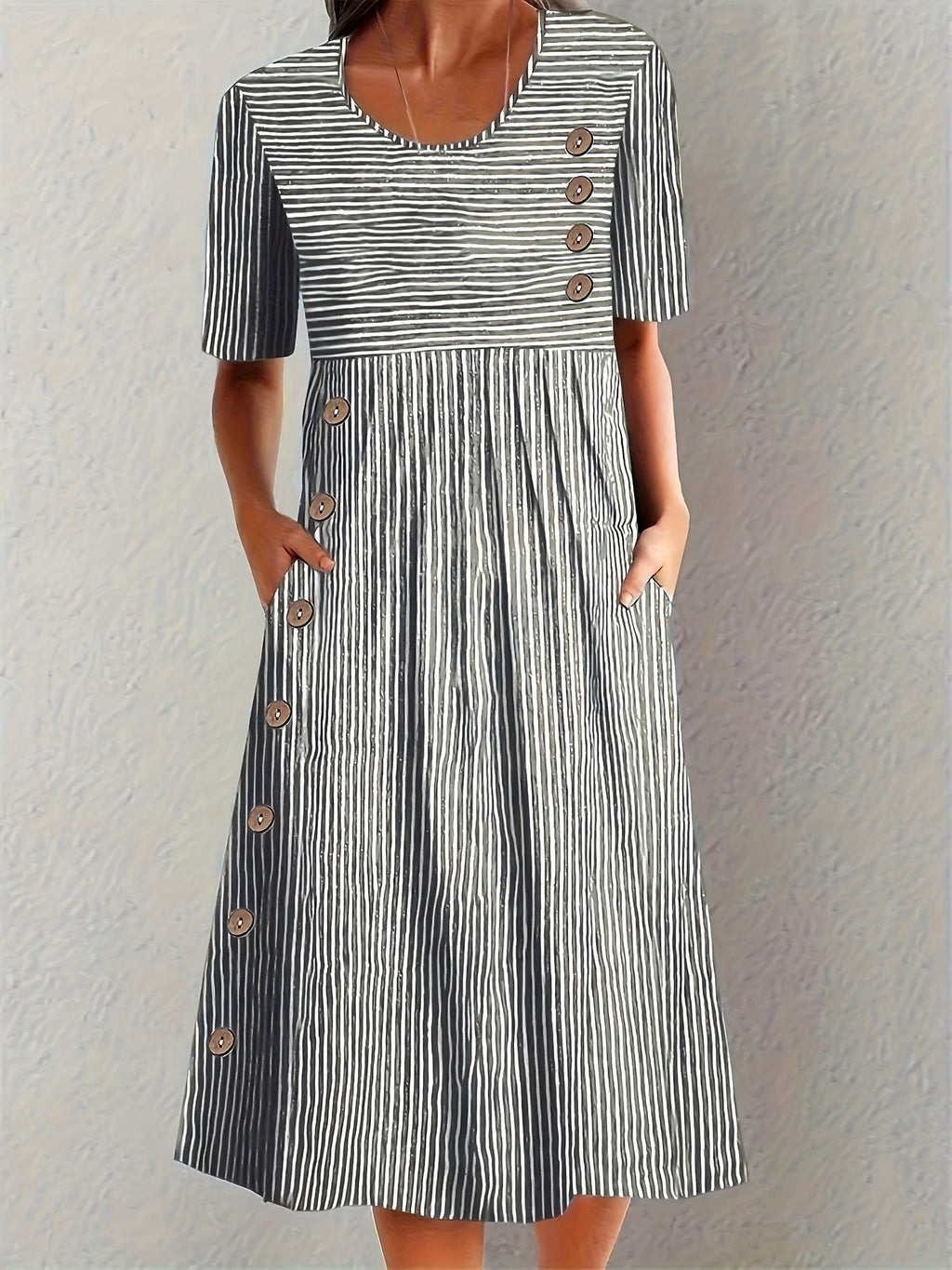 Black and white striped short-sleeve summer dress with button placket and skirt pleats