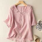 Light pink short-sleeve cotton blouse with scalloped peter pan collar and button-front
