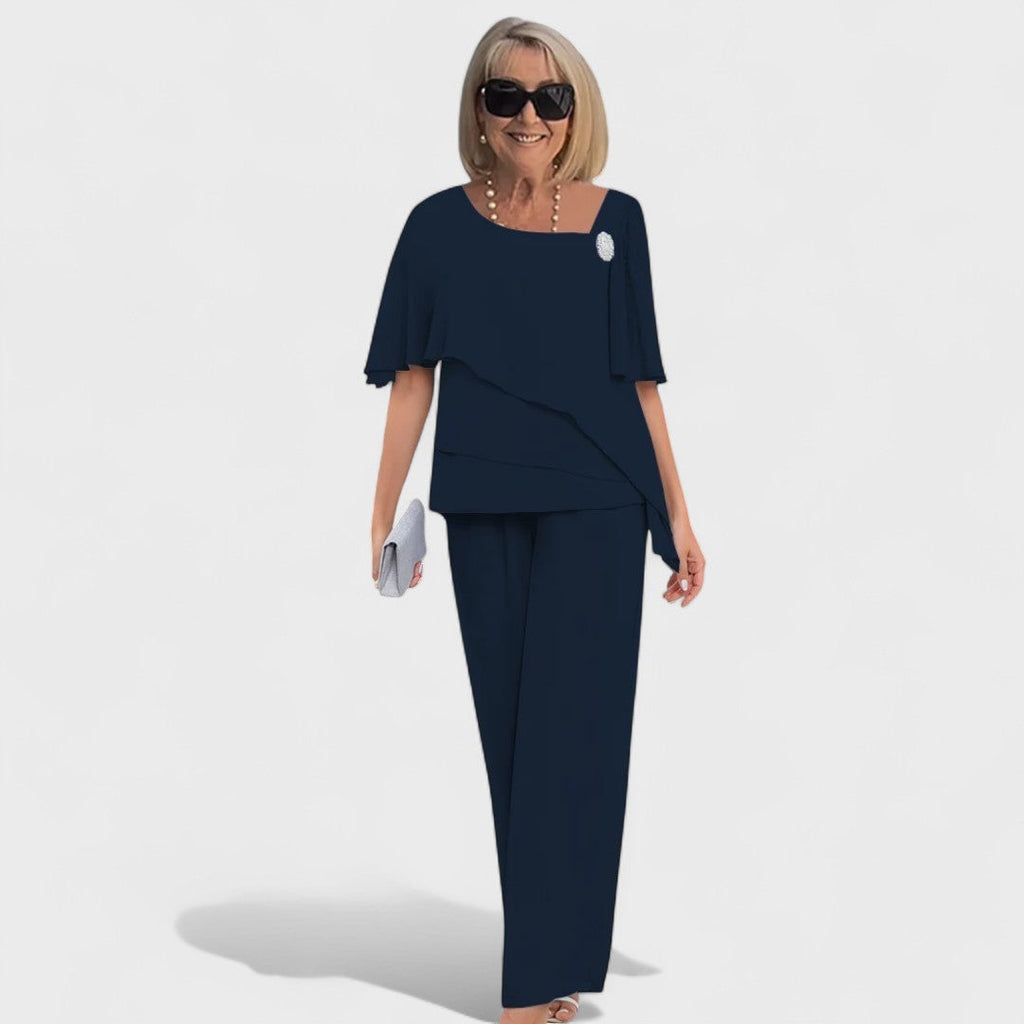 Navy two-piece set: short-sleeve layered top and matching straight-leg pants