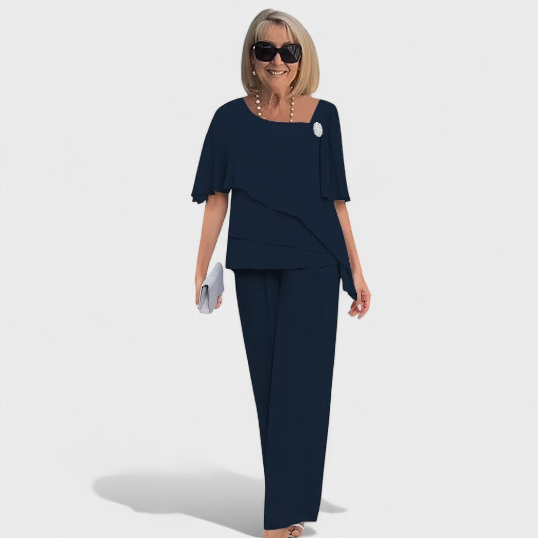 Navy two-piece set: short-sleeve layered top and matching straight-leg pants