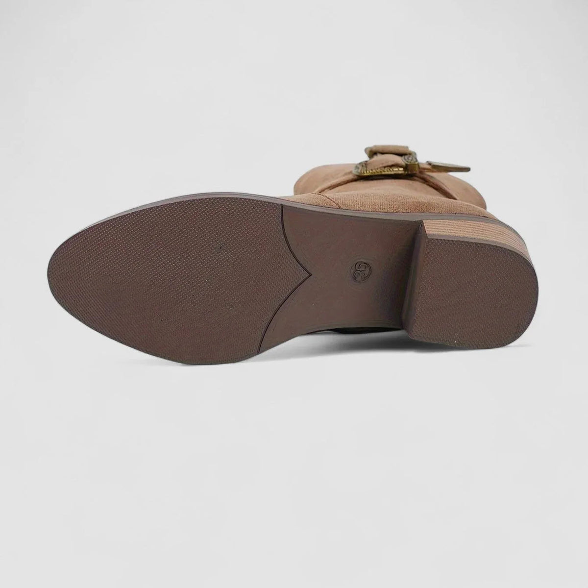 Brown western boot outsole and heel view with textured traction tread.