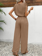 Taupe lace-trim sleeveless top and matching wide-leg pants, back view.