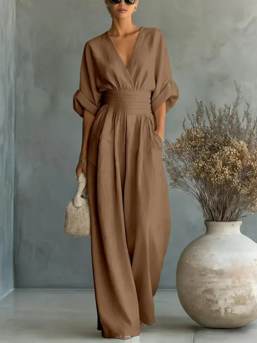 Mocha brown V-neck high-waist jumpsuit with cinched waist and wide-leg flow, dolman sleeves