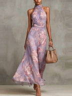 Floral chiffon halter maxi dress in light purple with pink floral print, high neck and gathered waist