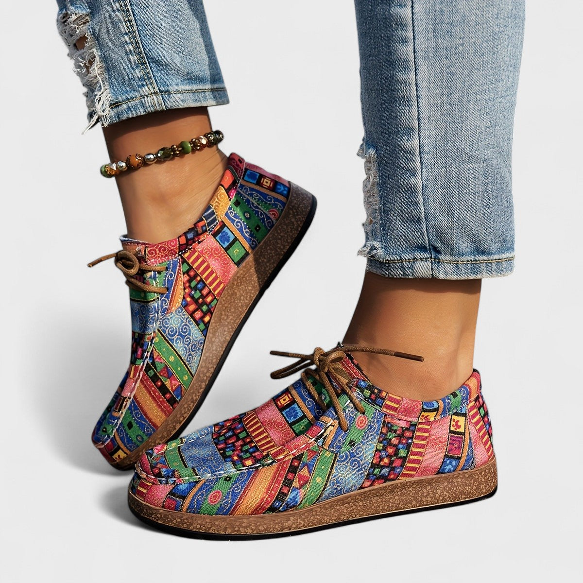 Seryphina™ orthopedic sneakers pair, multicolor patchwork uppers, lace-up front, low profile