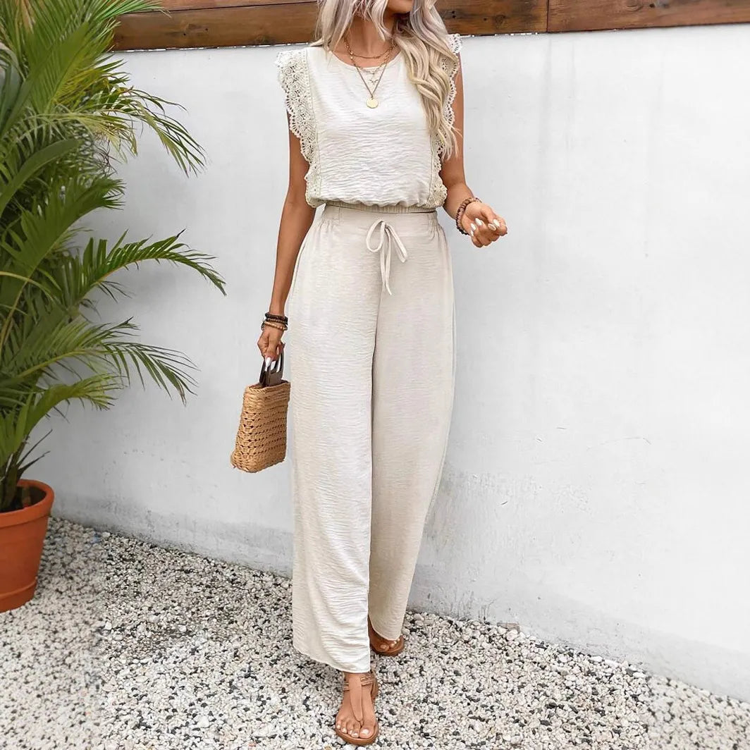 Cream sleeveless two-piece set with ruffle cap sleeves and drawstring wide-leg pants
