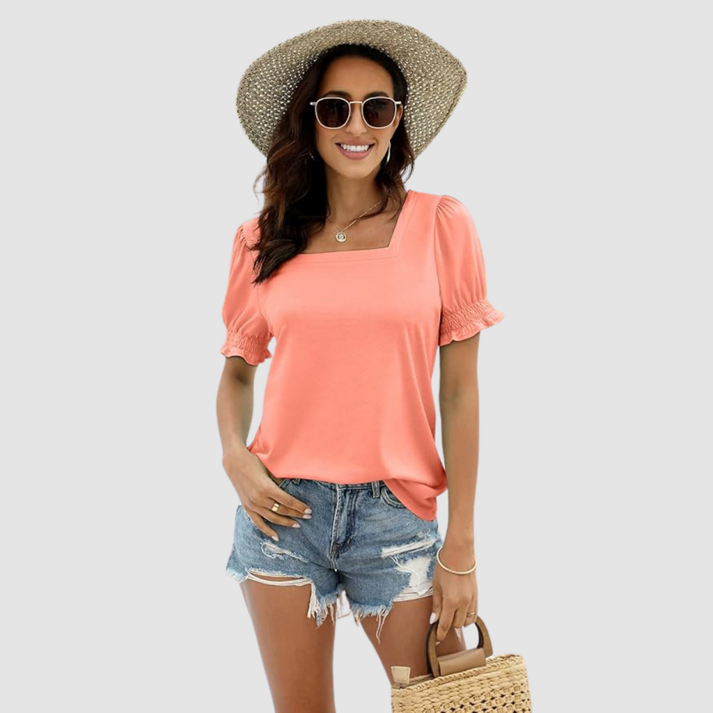 Square-neck blouse in coral pink with puff sleeves and gathered cuffs