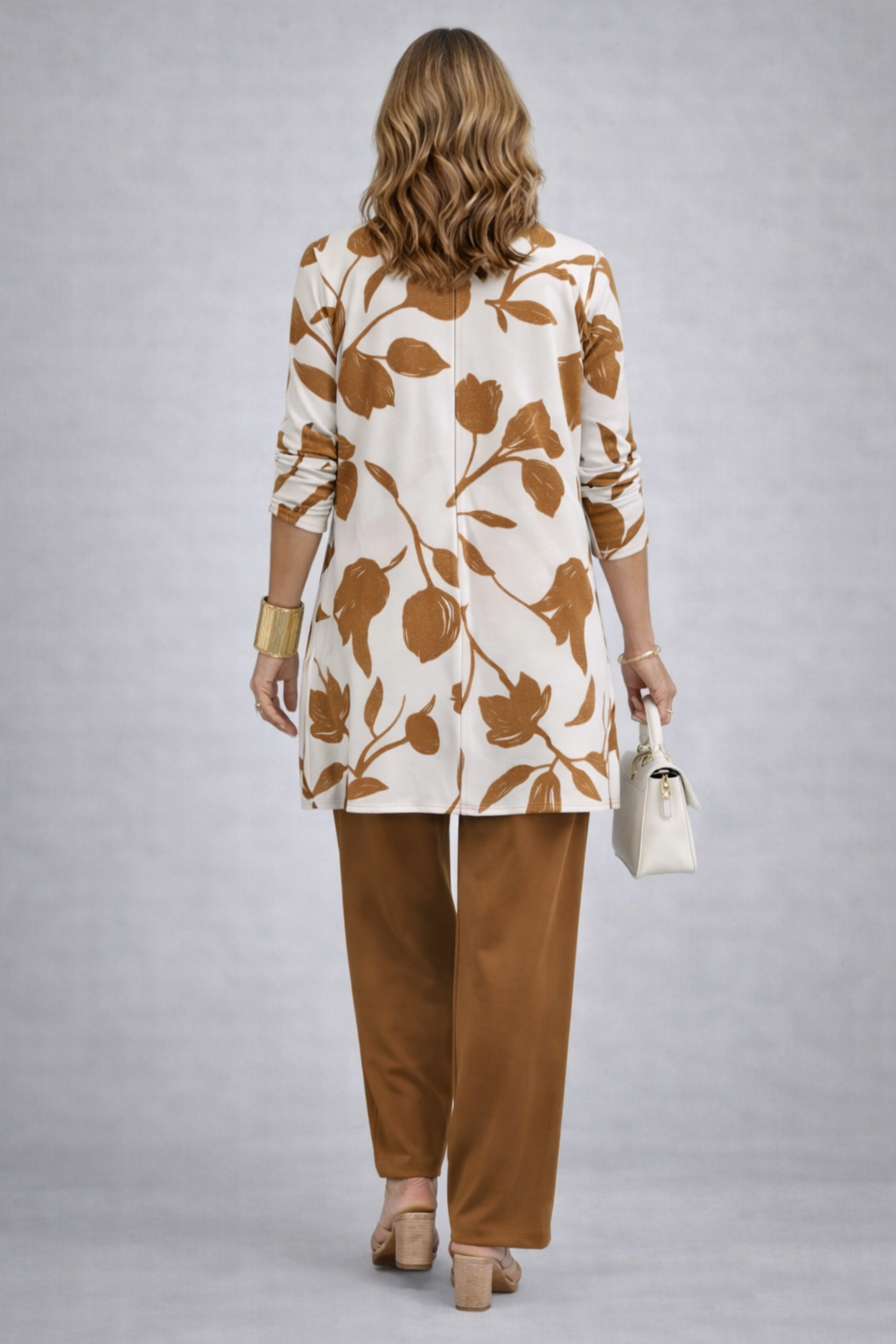 Back view of brown 3-piece set: floral tunic with 3/4 sleeves and matching pants