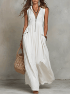 White zip-front sleeveless maxi dress with gathered waist and V-neck bodice