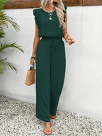 Dark green sleeveless two-piece set with ruffle-trim top and wide-leg pants