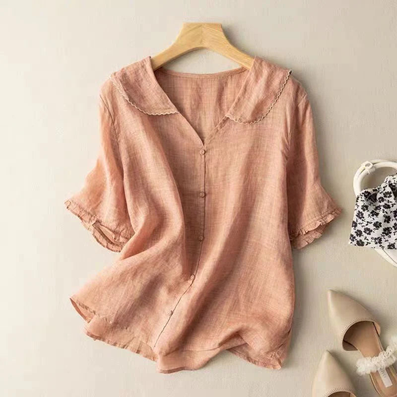 Pink short-sleeve cotton blouse with peter pan collar and button-front