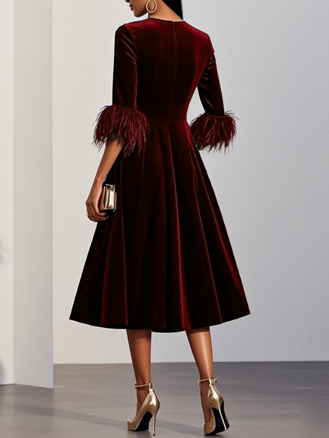 Burgundy velvet midi A-line dress, back view with feather-trimmed sleeves