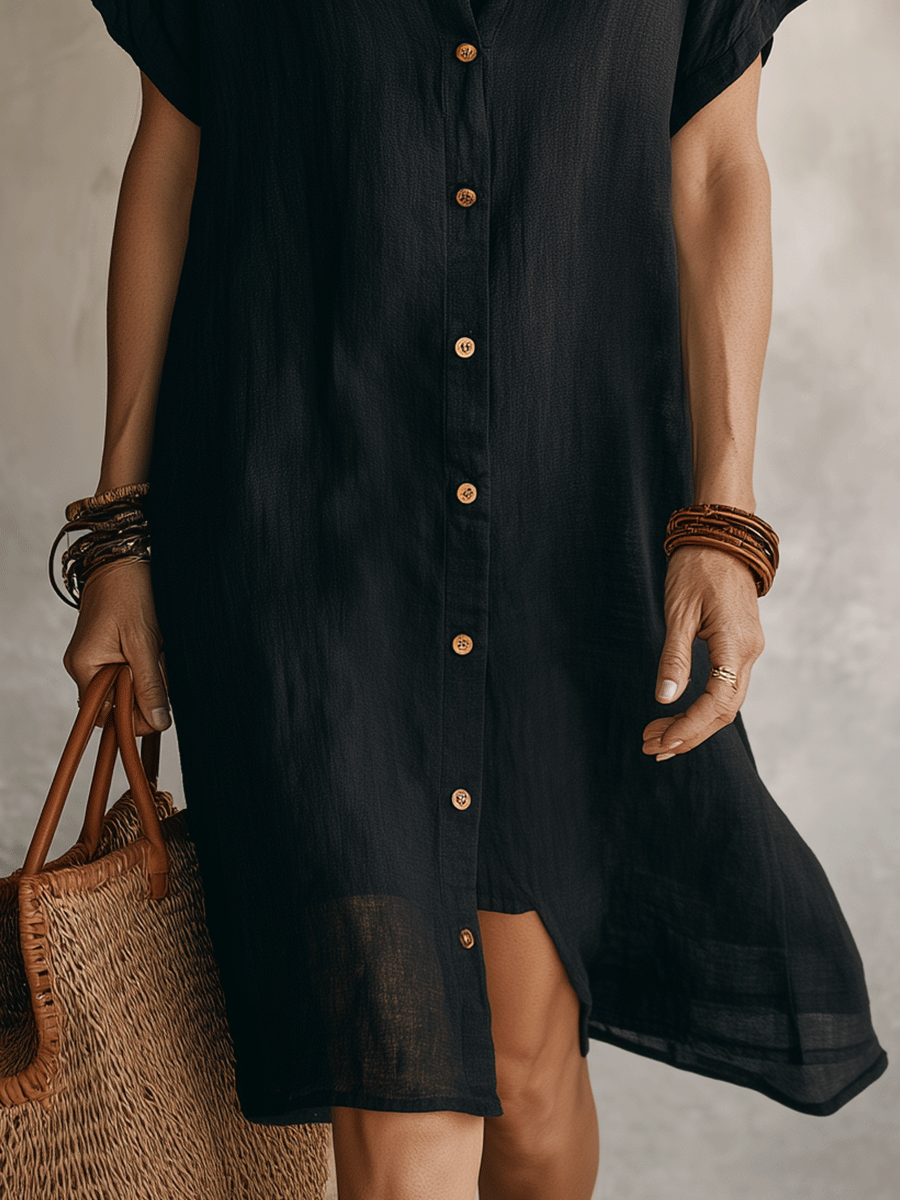 Black linen relaxed midi dress hem detail with front button placket and side slit