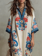 Ivory caftan midi dress with blue floral paisley, deep V neckline and wide kimono sleeves