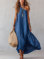 Royal blue striped off-the-shoulder maxi dress with flowing skirt and pleated bodice