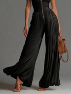 Black sleeveless V-neck zip-front pleated chiffon wide-leg jumpsuit, full-length view