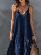 Navy blue sleeveless V-neck maxi dress with gathered tiered skirt