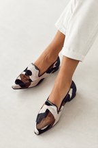 Black and white patterned loafers with pointed toe and cushioned lining