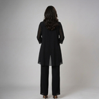 Black three-piece set back view with lace-trim draped jacket and wide-leg trousers