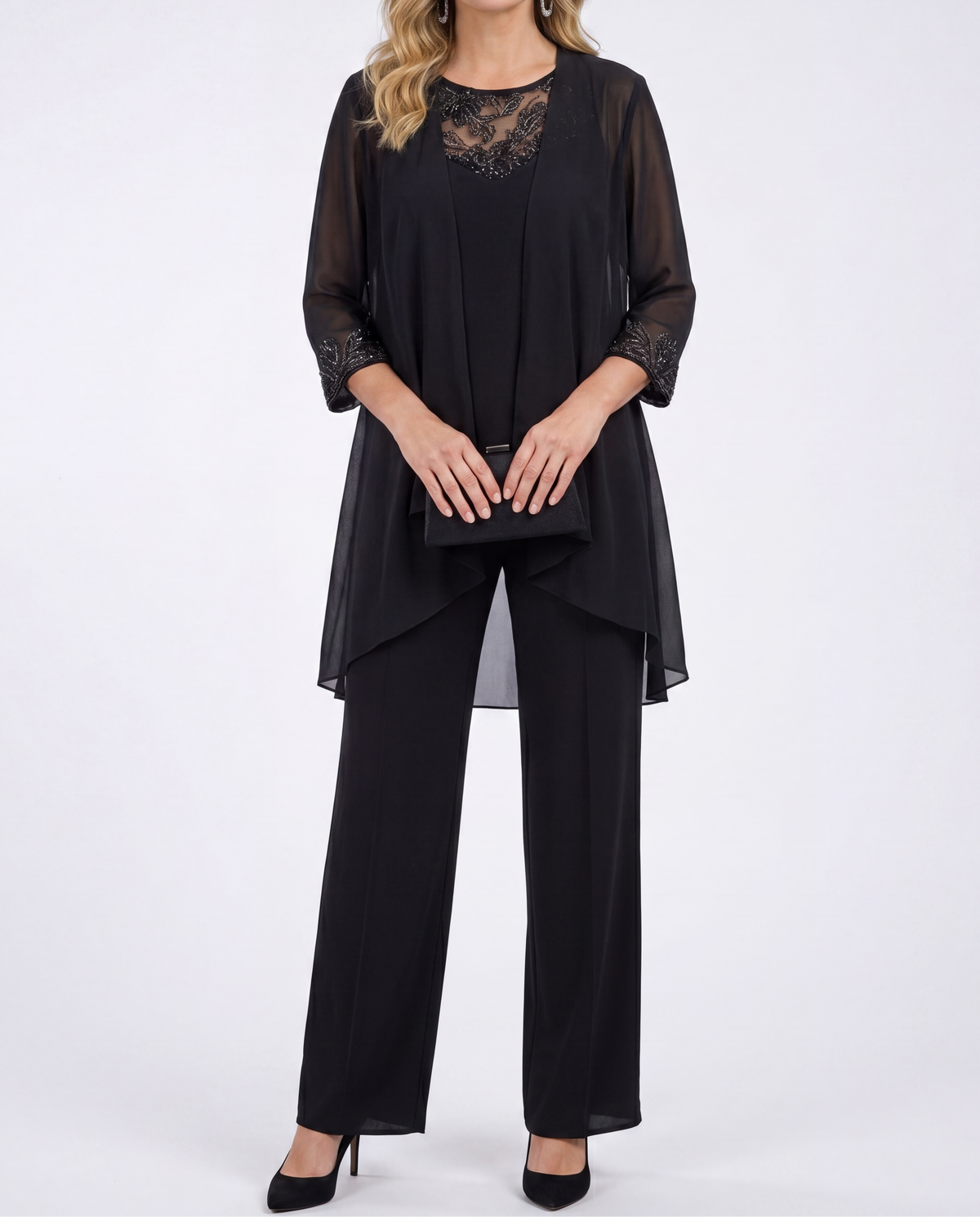 Black flowing jacket and wide-leg pants set with lace-trim neckline and cuffs