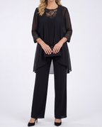 Black flowing jacket and wide-leg pants set with lace-trim neckline and cuffs