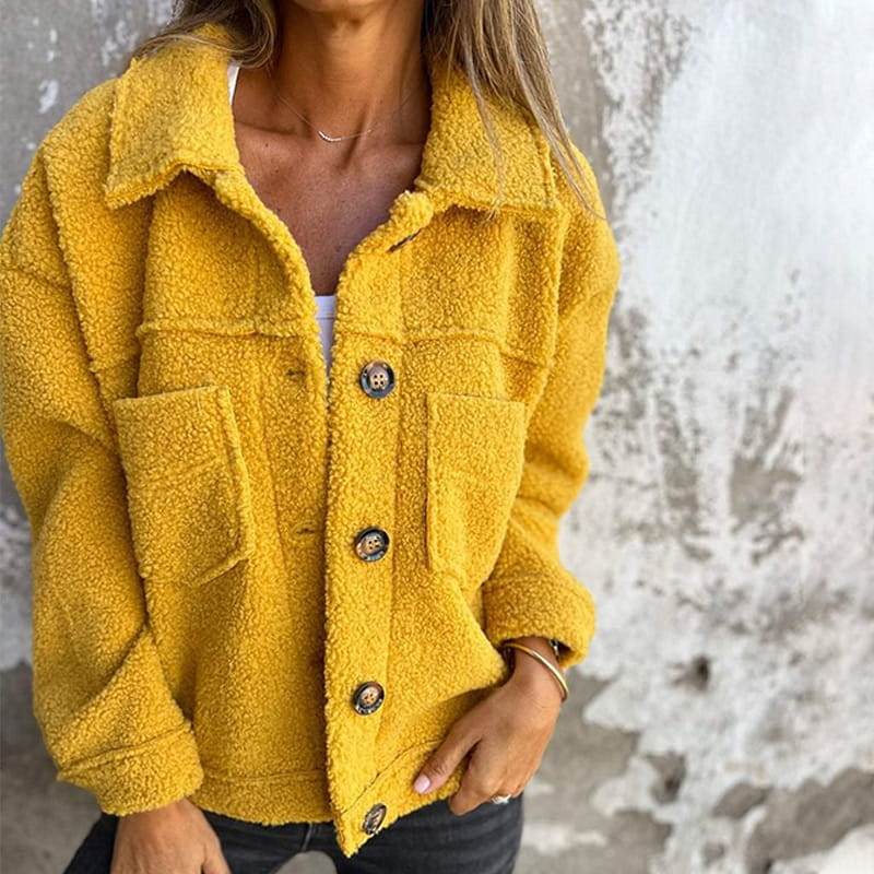 Mustard yellow teddy jacket with button front and two flap chest pockets