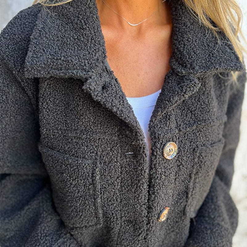 Charcoal gray teddy jacket with button front and flap chest pockets