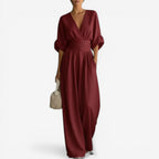 Claret wrap V-neck jumpsuit with gathered waist and loose wide-leg trousers