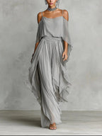 Gray off-shoulder draped top with spaghetti straps and flowy tiered maxi skirt set