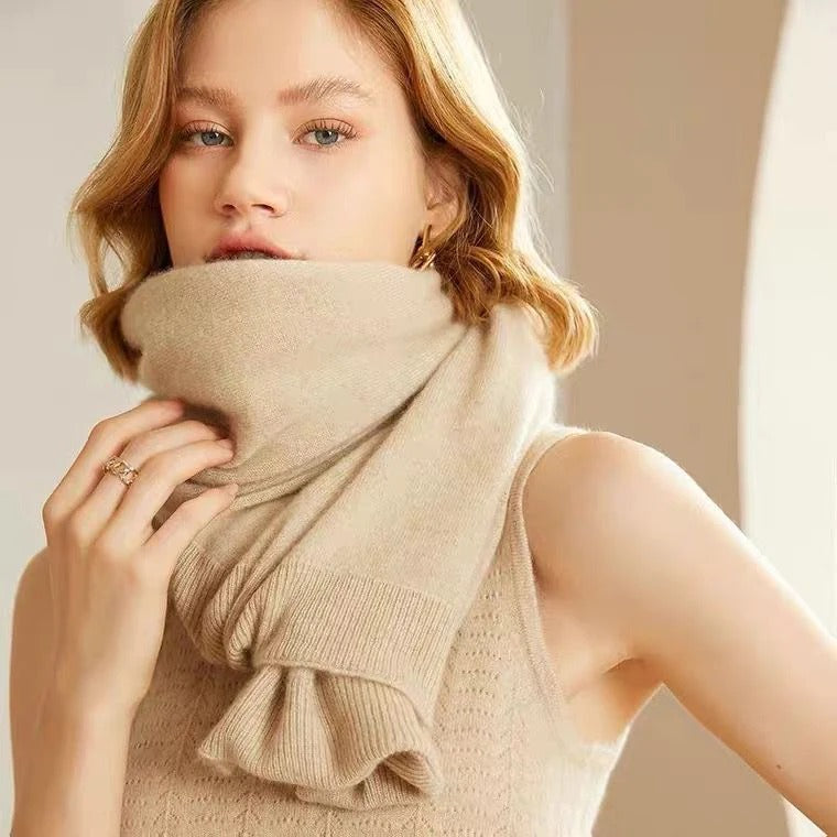 Light beige merino wool shawl with ruffled knit trim at edge