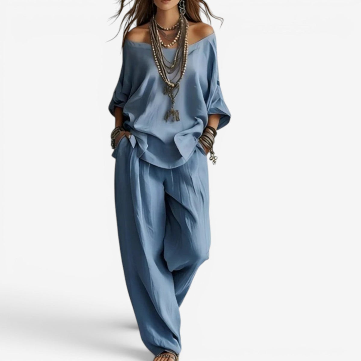 Blue off-shoulder blouse and draped pants set, layered necklace detail