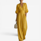 Yellow wrap V-neck jumpsuit with elastic waist and wide-leg trousers