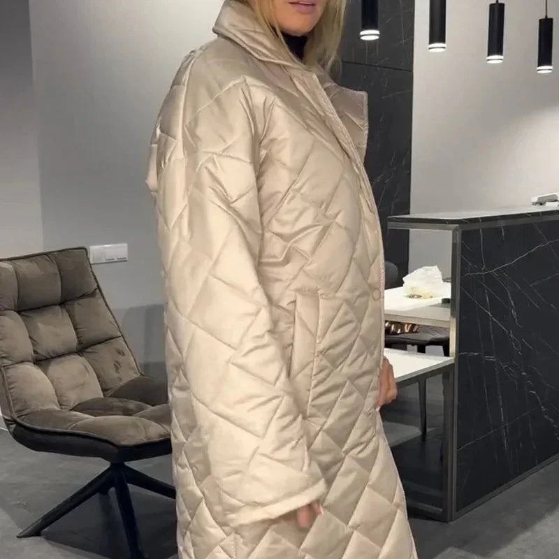 Beige quilted longline winter coat with zip front and high neck
