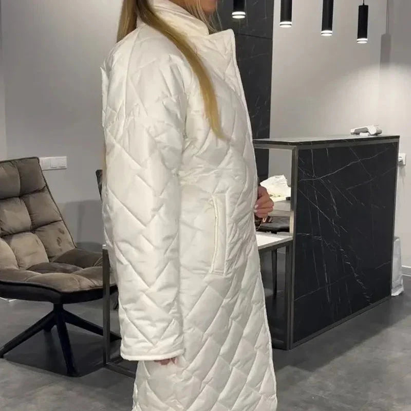 Cream-white quilted long winter coat with zip front and high neck