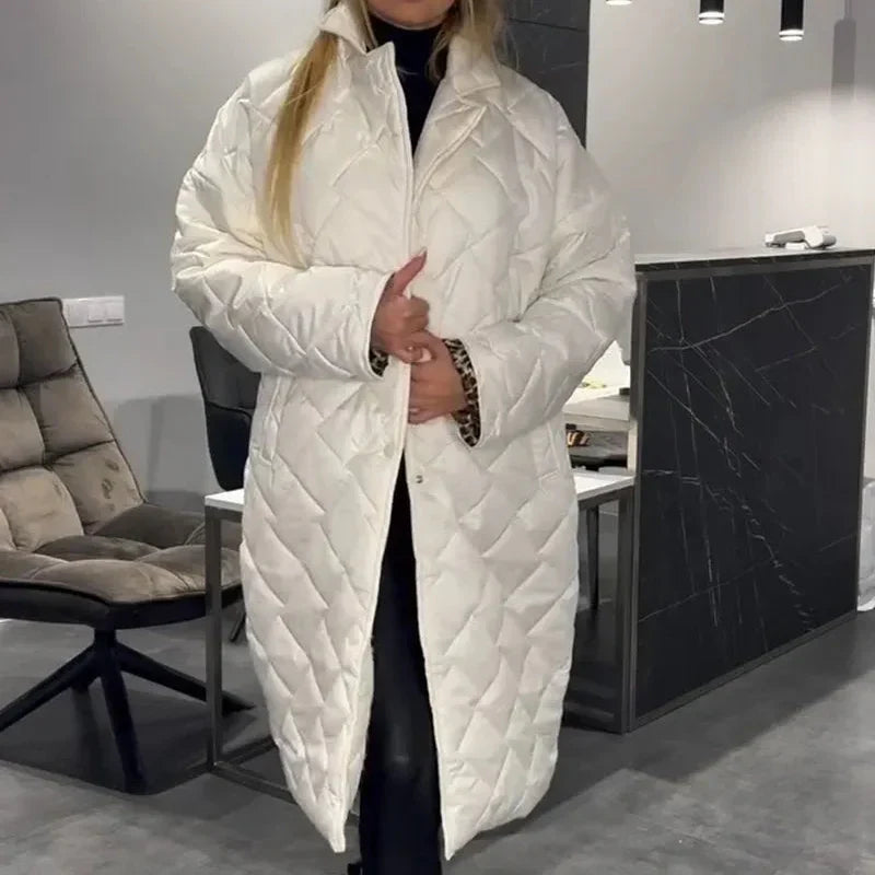 White quilted long winter coat with zip front and high collar