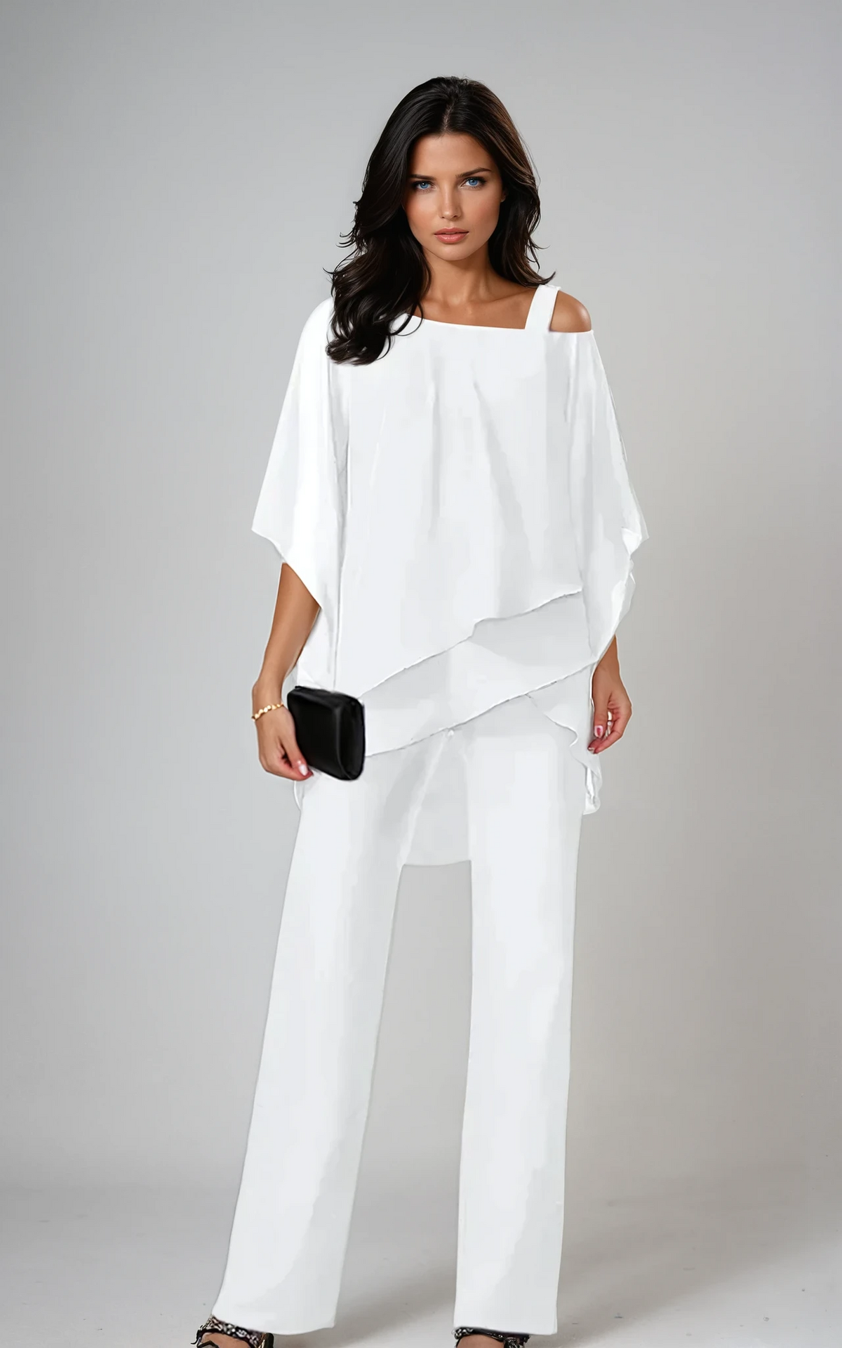 White layered cold-shoulder blouse with draped hem and wide-leg pants set