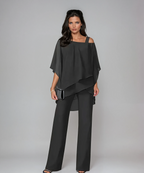 Black layered cold-shoulder blouse with asymmetrical drape and wide-leg pants set