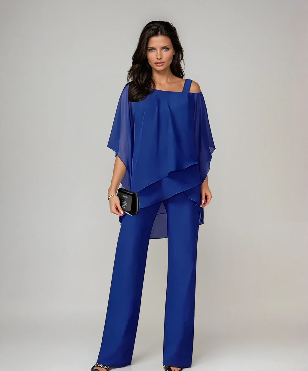 Blue layered cold-shoulder blouse with draped hem and wide-leg pants set