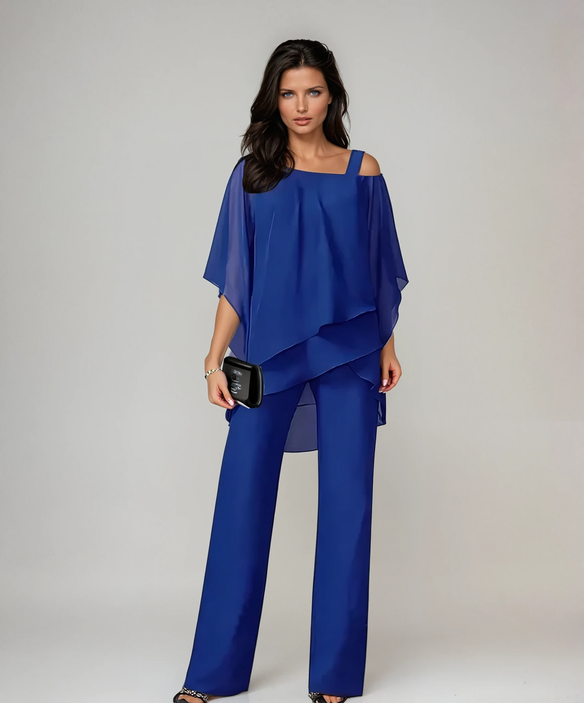 Blue layered cold-shoulder blouse with draped hem and wide-leg pants set