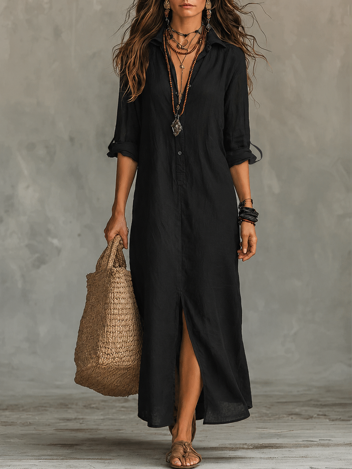 Black button-front maxi shirt dress with three-quarter sleeves and side slit