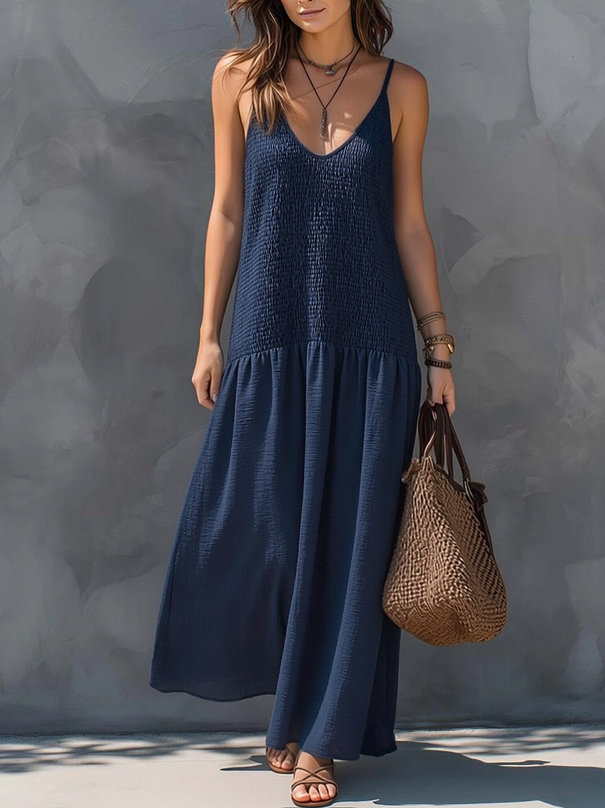 Navy blue sleeveless V-neck maxi dress with tiered, textured fabric