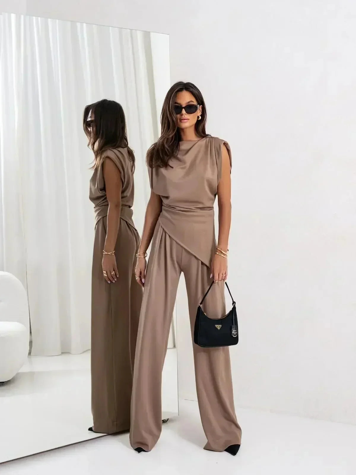 Taupe sleeveless wrap top and wide-leg pants two-piece set with cross front
