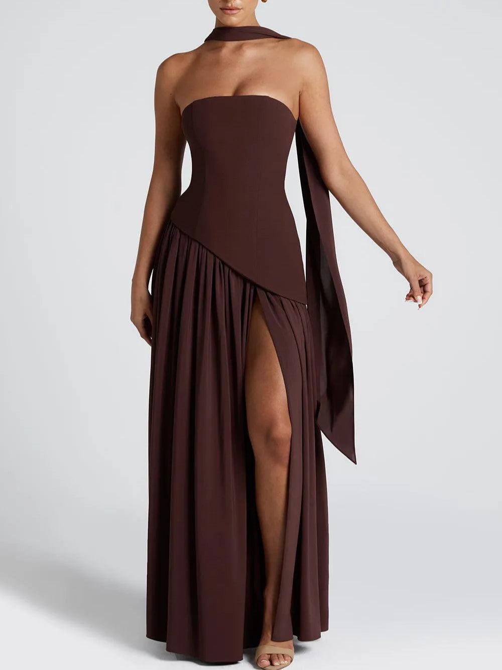 Strapless maxi dress in deep maroon with flowing draped panel and deep side slit