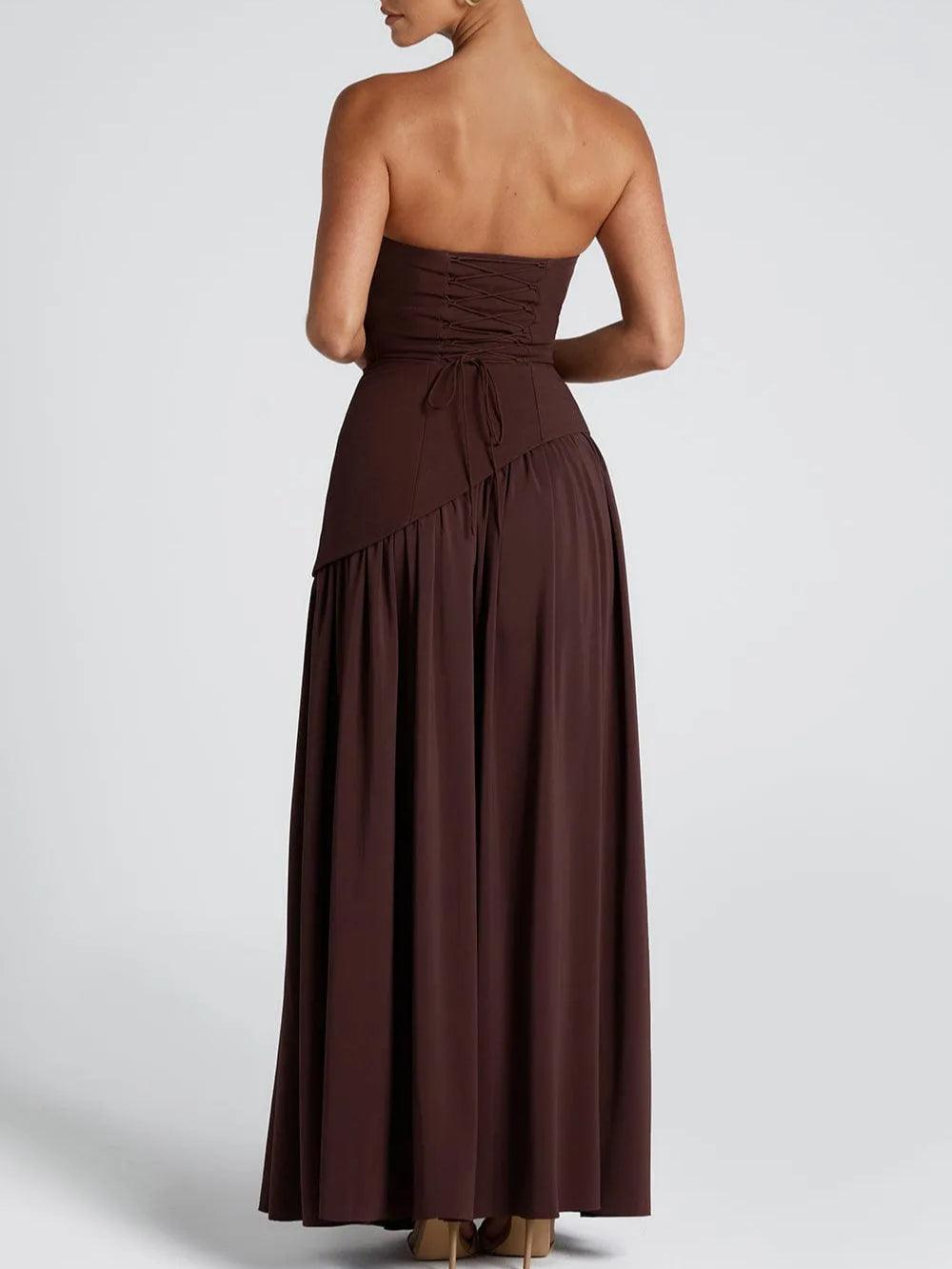 Strapless maxi dress in deep maroon with gathered back and tied ribbon at waist