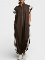 Brown zip-neck jumpsuit with drawcord hood and side triple stripe accents
